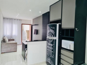 Casa com jacuzzi dentro de condomínio em Bertioga.